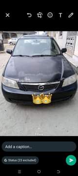 A picture of Toyota Mazda protege for sale Portharcourt Choba prescisely First body
