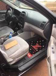 A picture of 2009 model Kia working Perfectly ok buy and travel 4plugs