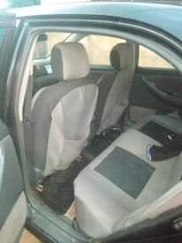A picture of 2003 model Toyota Corolla bank type