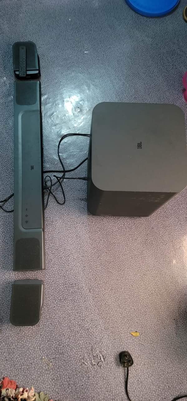 A picture of Ps 4 pro Jbl sound bar watts 1000 Lg sound