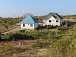 A picture of NUNUA KIWANJA KILICHOPIMWA BILA DALALI USIKUBALI KUHADISIWA NJOO UJIONEE SITE
