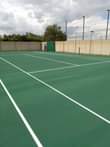 A picture of Tar surfaces and Tennis court