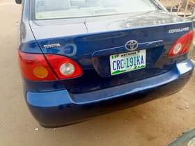 A picture of Distress two beautiful Corolla 03 04 model the two is