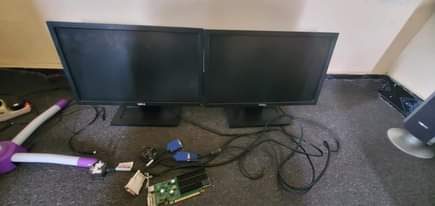 A picture of 2 Dell computer screen inch 20