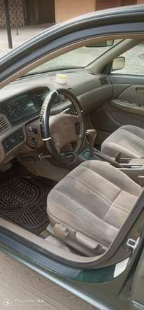 A picture of Sharp Toyota Camry AKA Tiny Light Engine AC Chilling Everything