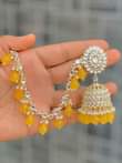 A picture of Kundan kan chain jhumkas