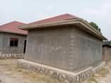 A picture of 3 houses for sale at Bombo Kalure near St Janan