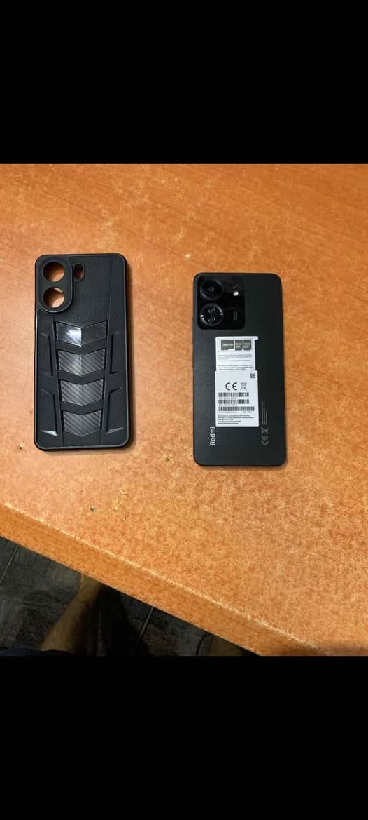 A picture of Redmi 13c 256gb 8gb ram 1 month Carton and Receipt