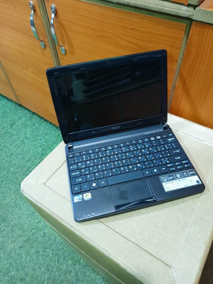 A picture of Acer min laptop call me or what s app 0702856458