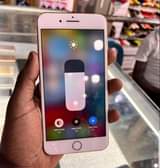 A picture of iphone 8plus in golden color fingerprint clean working 64gb swap