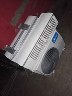 A picture of MIDEA 1 5 HORSE POWER INVERTER A C