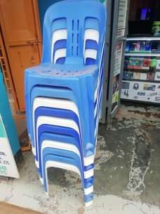 A picture of Nice House of plastics armless chairs at 20k each in
