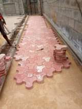 A picture of DESIGN WITH US YOUR COMPOUND outdoor bench building paver installation