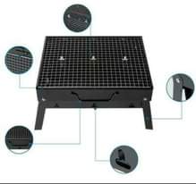A picture of lightweight portable folding picnic barbecue charcoal grill Message Saadia on