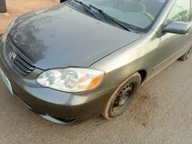 A picture of Distress two beautiful Corolla 03 04 model the two is
