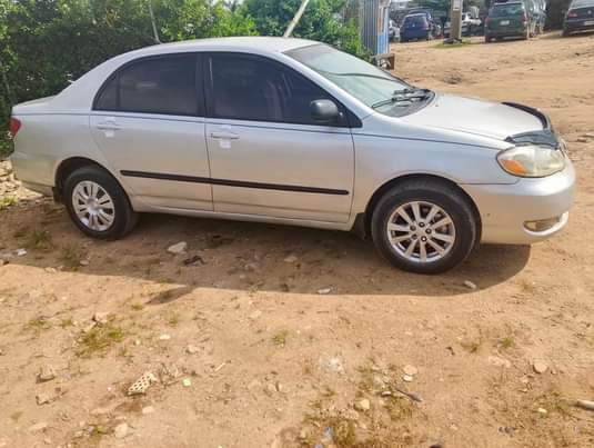 A picture of Distress Very sharp Toyota Corolla LE 2004 everything blessed with