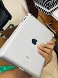 A picture of Apple ipad in good condition White in colour