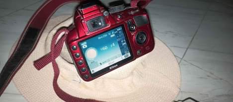 A picture of Camera Nikon d3100 Made in Thailand Excellent condition Lens 55