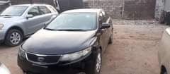 A picture of Kia Cerato 2012 with a bad gear Ac working Sound