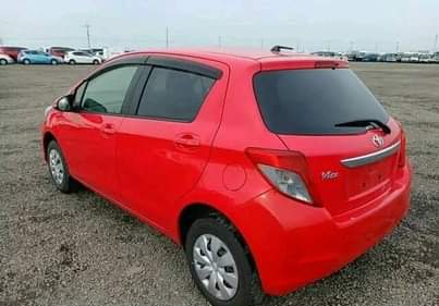 A picture of 2013 TOYOTA VITZ _990CC UGX 42M This is push to