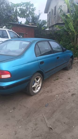 A picture of Toyota carina e 09063393963