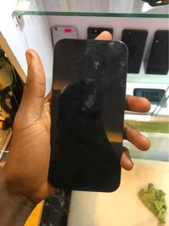 A picture of Sim locked iphone 12pro max 128gb