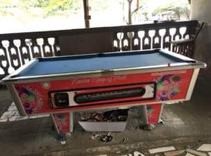 A picture of Pooltable Kama linavyoonekana kazi imenyooka sana na kitambaa nakuwekea kipya