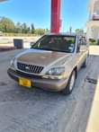 A picture of 2002 harrier gold colour sports
