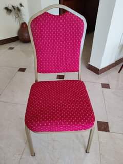 A picture of Four cushioned chairs