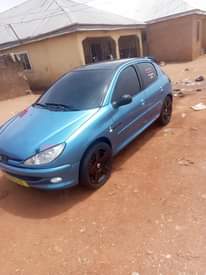 A picture of AbujaDistress sale pegout 206 Manual neatly used untempered engine and
