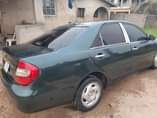 A picture of 9ja used Toyota Camry 2004 model with tapping engine Ac
