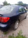 A picture of 2004 COROLLA painted on first body engine and gear AC