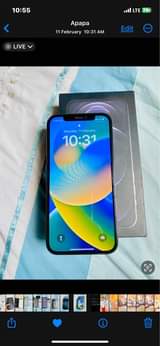A picture of iPhone 12Pro 128gig battery 87 NFID with carton nd receipt