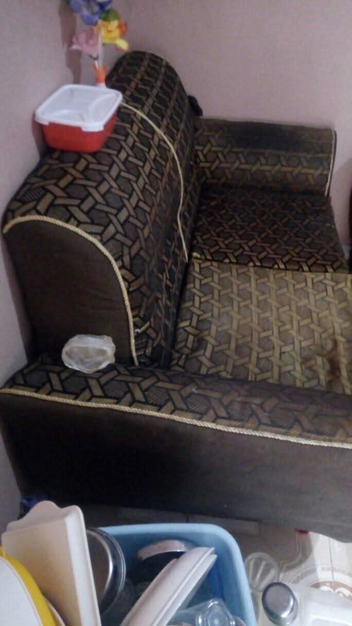 A picture of Sofa set bed glass table