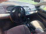A picture of 04 Toyota Camry big daddy Ibadan painted Engine gear and