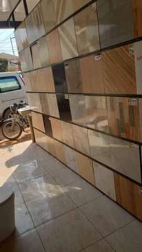 A picture of Tiles toilet seats sinks taps work tops etc
