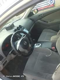 A picture of 2010 THUMB START NISSAN ALTIMA WITH ANDROID SCREEN.