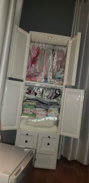 A picture of Lamp 100k babys white plastic tall closet 380k dressing mirror