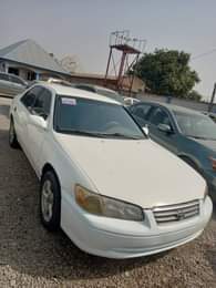 A picture of WHITE A Neatly Used Toyota Camry pencil 2002 Model With