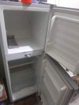 A picture of 138 ltr fridge and 40inch Tv
