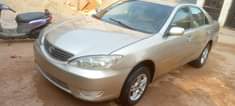 A picture of 2005 camry buy and drive with a c chilling nothing
