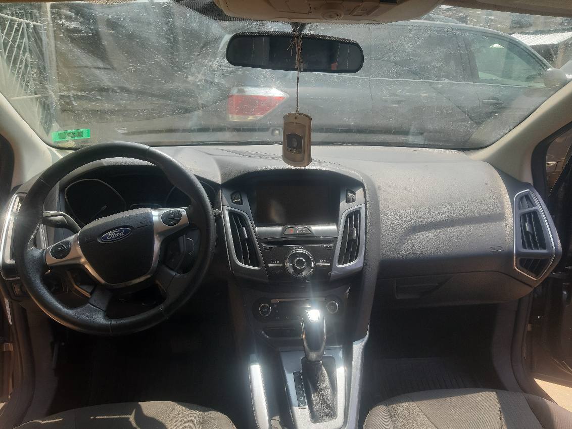 A picture of FORD FOCUS 2012 FOREIGN USED WITH THUMBSTART