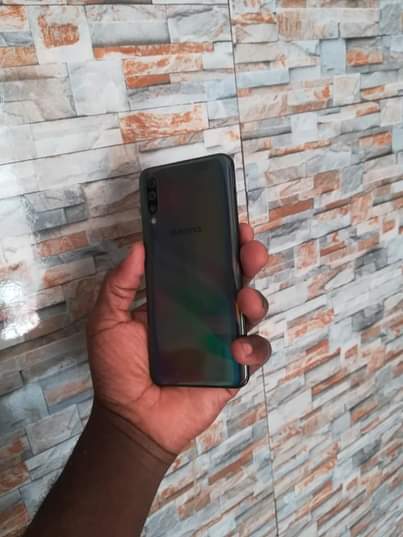 A picture of Samsung galaxy A50 64gb 4gbram. Clean no cracks at just