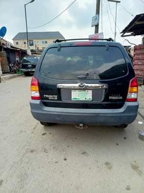 A picture of For sale asking price 2 3m Mazda tribute in Ajah