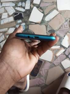 A picture of Tecno spark GO 2020 with receipt