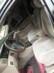 A picture of Corolla LE 2003 model with untempered engine going for 2