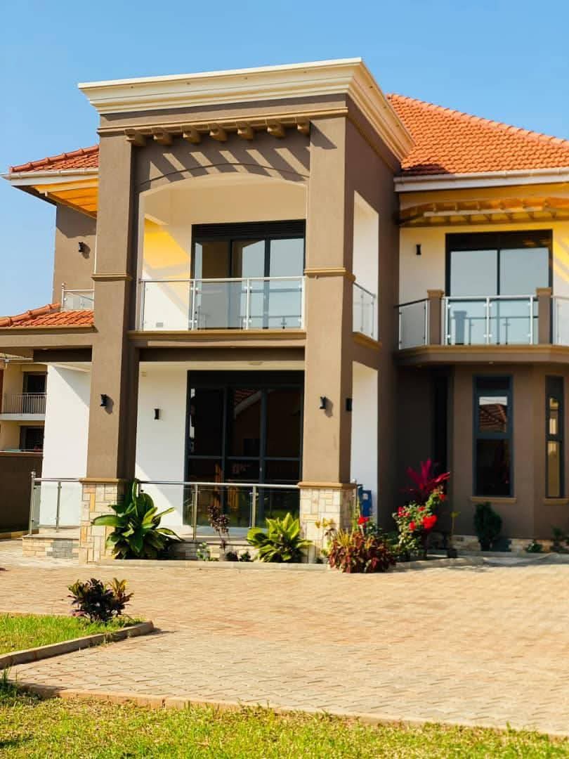 A picture of NEW FLAT HOUSE FOR SALE KIGO MUNYONYO EXPRESSWAY 5BEDROOMS SEATING