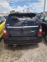 A picture of Subaru forester 2007 2000cc black in colour call or whatsup