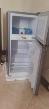 A picture of FRIDGE ZURI JIPYA NA BOX LAKE NA KILA KITU LIMETUMIKA