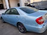 A picture of QUICK SALE TOYOTA CAMRY 2004 ac need attention and body